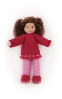 Mädchen mit braunen Locken, pinknem Pullover und rosa Hose / Größe 9cm